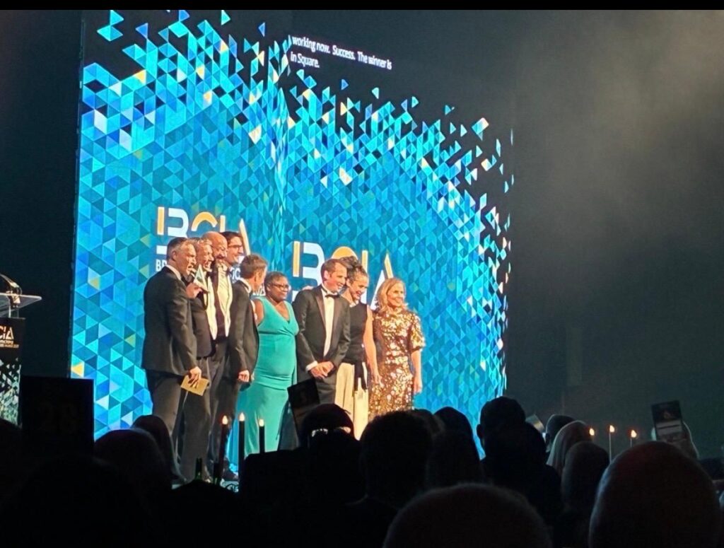 
2-Ruskin-Square-Wins-Commercial-Property-Project-of-the-Year-at-BCIA-group-receiving-the-award-8th-october