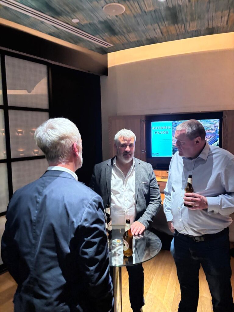 Real-PM-Drinks-Reception-candid-photo-inside-with-Botanic-place-in-the-background-2nd-October